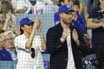 El Príncipe Harry y Meghan Markle durante el juego de Dodgers y Blue Jays. El Príncipe Harry y Meghan Markle durante el juego de Dodgers y Blue Jays.