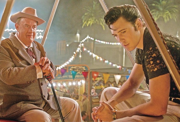 Tom Hanks encarna al coronel Tom Parker, una figura peligrosa y poderosa en la vida de Presley. Tom Hanks encarna al coronel Tom Parker, una figura peligrosa y poderosa en la vida de Presley.