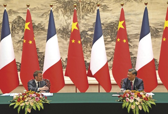 Macron y Xi, en su rueda de prensa conjunta, en Pekín. Macron y Xi, en su rueda de prensa conjunta, en Pekín.