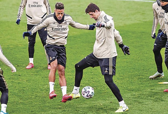 Mariano y Thibaut Courtois durante su entrenamiento. Mariano y Thibaut Courtois durante su entrenamiento.