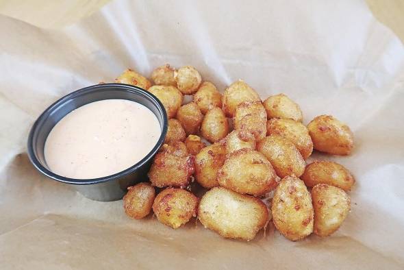Cheddar cheese curds. Cheddar cheese curds.