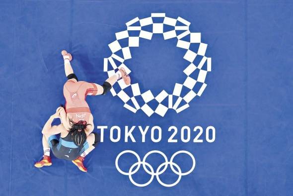 En Japón los juegos fueron recibidos con opiniones mixtas y preocupación por el covid- 19. En Japón los juegos fueron recibidos con opiniones mixtas y preocupación por el covid- 19.