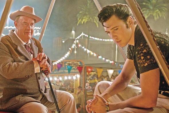 Tom Hanks encarna al coronel Tom Parker, una figura peligrosa y poderosa en la vida de Presley. Tom Hanks encarna al coronel Tom Parker, una figura peligrosa y poderosa en la vida de Presley.
