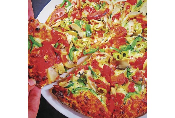 Pizza tradicional de Don Genaro Pizza tradicional de Don Genaro