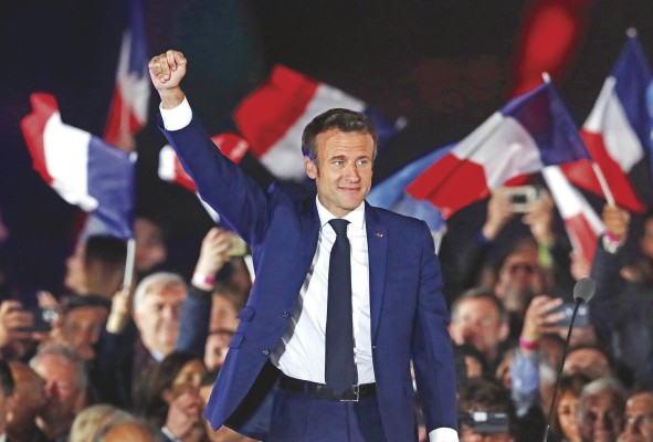 Emmanuel Macron celebra su victoria electoral en foto de archivo. Emmanuel Macron celebra su victoria electoral en foto de archivo.