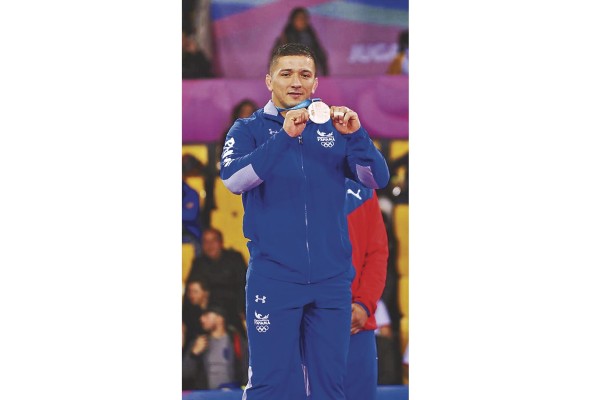 El atleta panameño se desempeña en el estilo libre y grecorromano de lucha olímpica. El atleta panameño se desempeña en el estilo libre y grecorromano de lucha olímpica.