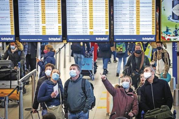 Viajeros fueron registrados este jueves en el Aeropuerto Internacional de Schiphol, en Amsterdam (Países Bajos) Viajeros fueron registrados este jueves en el Aeropuerto Internacional de Schiphol, en Amsterdam (Países Bajos)