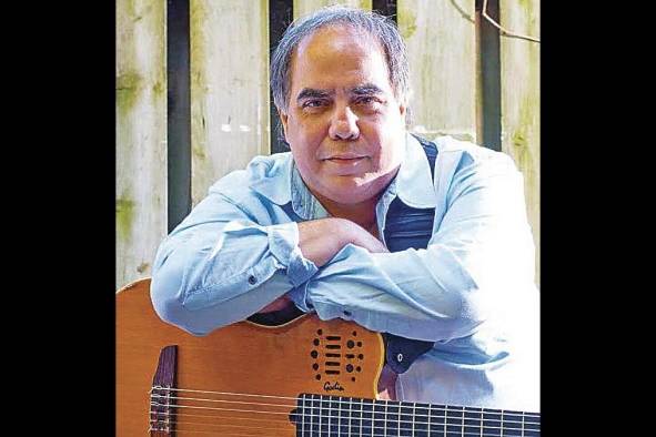 El guitarrista y compositor de Venezuela Aquiles Báez. El guitarrista y compositor de Venezuela Aquiles Báez.