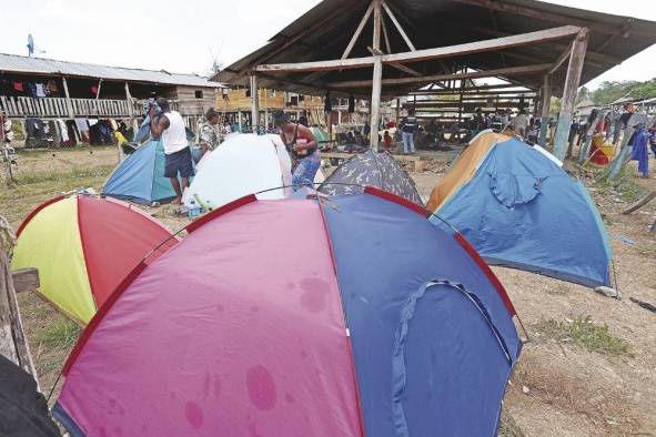 Los migrantes siguen llegando de Colombia, pues cuando se inició el paro, cientos de personas ya estaban atravesando la selva. Los migrantes siguen llegando de Colombia, pues cuando se inició el paro, cientos de personas ya estaban atravesando la selva.