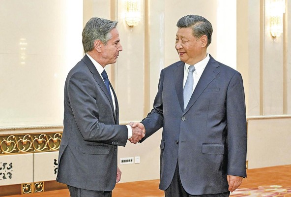 El presidente chino, Xi Jinping, y el secretario de Estado de EE.UU., Antony Blinken El presidente chino, Xi Jinping, y el secretario de Estado de EE.UU., Antony Blinken