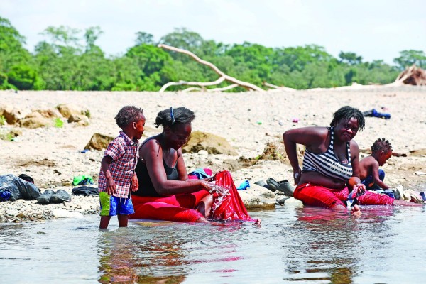 Migrantes persiguen sus sueños en medio de la mortífera pandemia de la covid-19 Migrantes persiguen sus sueños en medio de la mortífera pandemia de la covid-19