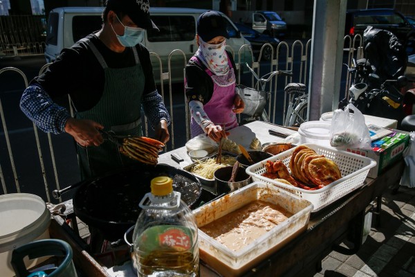 Comerciantes chinos. Comerciantes chinos.