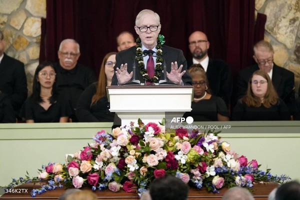 Jack Carter, son of former US President Jimmy Carter, speaks during a funeral service for former US First Lady Rosalynn Carter, at Maranatha Baptist Church in Plains, Georgia, on November 29, 2023. - Former US first lady Rosalynn Carter, who died last week at the age of 96, will be buried at her home in Georgia later on November 29, 2023, following a private funeral service attended by her ailing husband Jimmy Carter. The burial comes after a public ceremony on November 28, 2023, in Atlanta where President Joe Biden and former president Bill Clinton, as well as all five living first ladies, paid their final respects. (Photo by Alex Brandon / POOL / AFP) Jack Carter, son of former US President Jimmy Carter, speaks during a funeral service for former US First Lady Rosalynn Carter, at Maranatha Baptist Church in Plains, Georgia, on November 29, 2023. - Former US first lady Rosalynn Carter, who died last week at the age of 96, will be buried at her home in Georgia later on November 29, 2023, following a private funeral service attended by her ailing husband Jimmy Carter. The burial comes after a public ceremony on November 28, 2023, in Atlanta where President Joe Biden and former president Bill Clinton, as well as all five living first ladies, paid their final respects. (Photo by Alex Brandon / POOL / AFP)