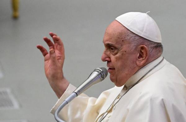 Pope Francis speaks during an audience to Members of the committee and the foundation World Youth Day Lisbon 2023 on November 30, 2023 at Paul-VI hall in The Vatican. (Photo by Tiziana FABI / AFP) Pope Francis speaks during an audience to Members of the committee and the foundation World Youth Day Lisbon 2023 on November 30, 2023 at Paul-VI hall in The Vatican. (Photo by Tiziana FABI / AFP)