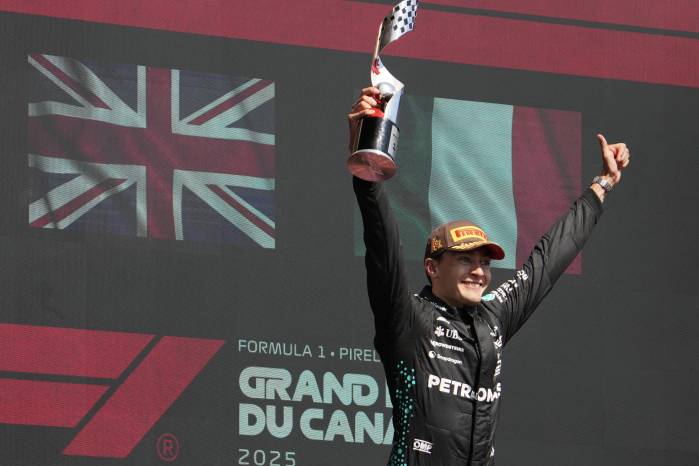 El piloto británico, George Rossell celebrando la victoria en el Gran Premio de Canadá. El piloto británico, George Rossell celebrando la victoria en el Gran Premio de Canadá.