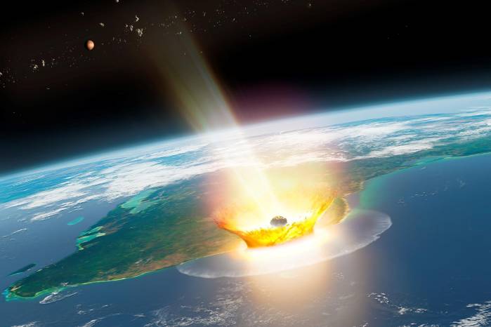 Impresión artística del impacto de un gran asteroide en la Tierra, como el de Chicxulub, que provocó la extinción masiva del Cretácico, hace 66 millones de años. Impresión artística del impacto de un gran asteroide en la Tierra, como el de Chicxulub, que provocó la extinción masiva del Cretácico, hace 66 millones de años.