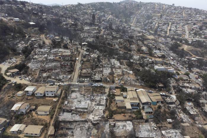 Fotografía aérea de archivo que muestra el sector de Achupallas, afectado por incendios forestales de Viña del Mar, Región de Valparaíso (Chile). Fotografía aérea de archivo que muestra el sector de Achupallas, afectado por incendios forestales de Viña del Mar, Región de Valparaíso (Chile).