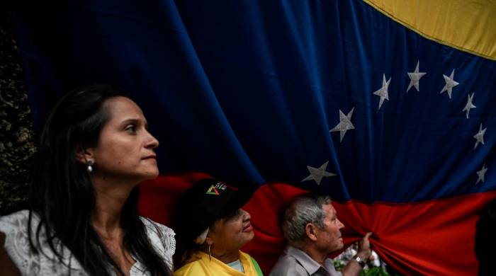 Simpatizantes de la líder opositora María Corina Machado asisten a una manifestación en Venezuela.