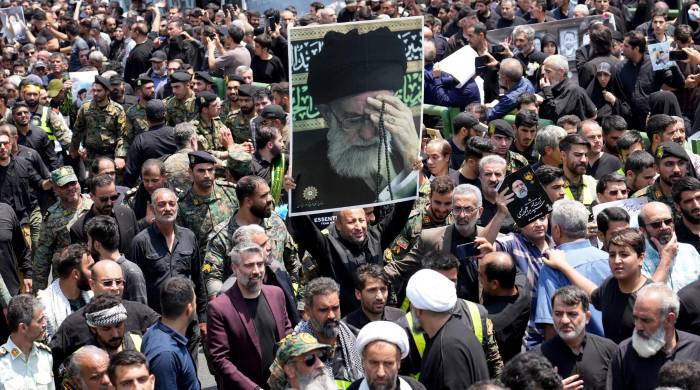 Los dolientes llevan un retrato del líder supremo de Irán, el ayatolá Ali Jamenei, durante el paso del funeral del presidente de Irán. Los dolientes llevan un retrato del líder supremo de Irán, el ayatolá Ali Jamenei, durante el paso del funeral del presidente de Irán.
