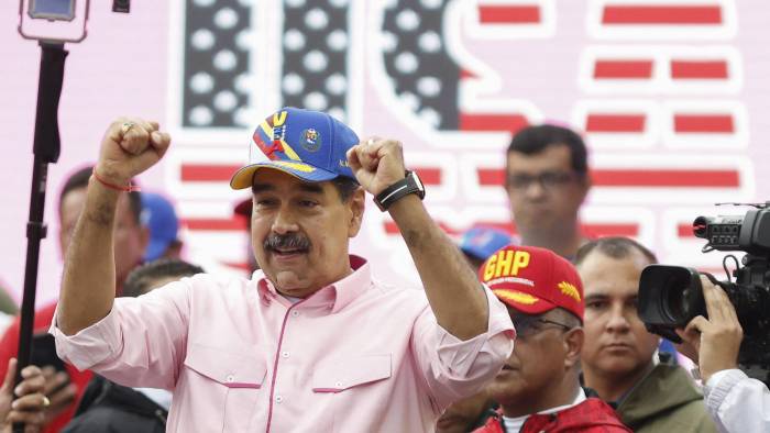 El presidente de Venezuela, Nicolás Maduro, hace un gesto durante una marcha para conmemorar el Primero de Mayo (Día del Trabajo). El presidente de Venezuela, Nicolás Maduro, hace un gesto durante una marcha para conmemorar el Primero de Mayo (Día del Trabajo).