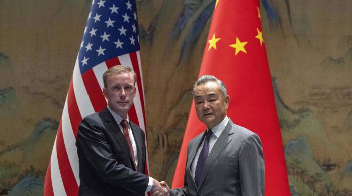 El jefe de la diplomacia china, Wang Yi (derecha) y el asesor de la Casa Blanca Jake Sullivan antes de su entrevista en Pekín. El jefe de la diplomacia china, Wang Yi (derecha) y el asesor de la Casa Blanca Jake Sullivan antes de su entrevista en Pekín.