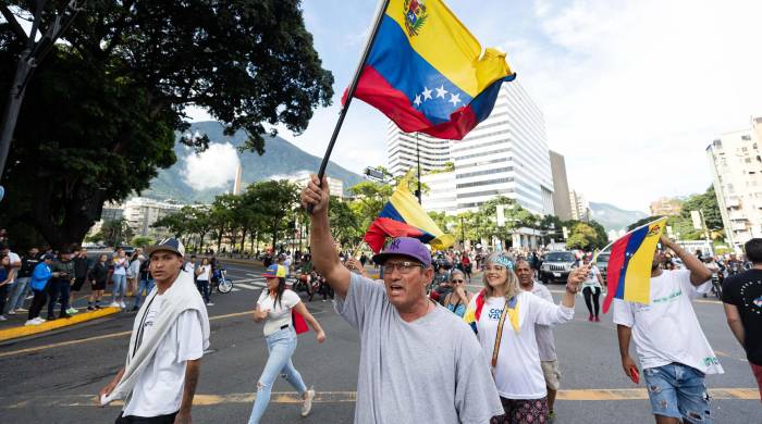 Fotografía de archivo donde se ve a personas durante una protesta contra los resultados oficiales de las elecciones presidenciales en Caracas. Fotografía de archivo donde se ve a personas durante una protesta contra los resultados oficiales de las elecciones presidenciales en Caracas.
