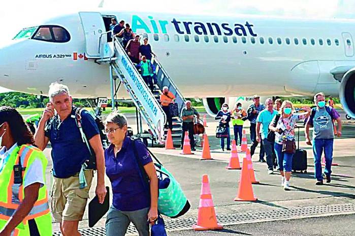 Imagen de archivo donde se muestran pasajeros que llegan al Aeropuerto de Río Hato en vuelo chárter. Imagen de archivo donde se muestran pasajeros que llegan al Aeropuerto de Río Hato en vuelo chárter.