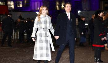 La princesa Beatriz de York de Gran Bretaña y su esposo Edoardo Mapelli Mozzi asisten al “Servicio de villancicos juntos en Navidad” en la Abadía de Westminster, en Londres, el 15 de diciembre de 2022.