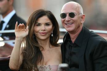 Amazon's founder Jeff Bezos and spouse Lauren Sanchez Bezos leave the Aman Hotel on the third day of their wedding festivities, in Venice on June 28, 2025. (Photo by Marco BERTORELLO / AFP)