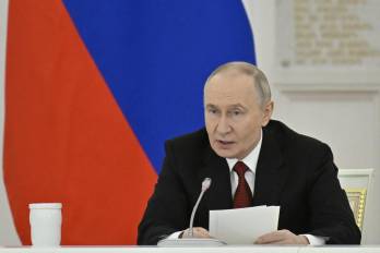 Russian President Vladimir Putin chairs a State Council meeting at the Kremlin in Moscow on December 25, 2025.
