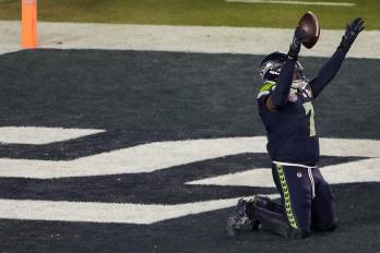 SANTA CLARA, CALIFORNIA - FEBRUARY 08: Uchenna Nwosu #7 of the Seattle Seahawks celebrates a touchdown against the New England Patriots during the fourth quarter in Super Bowl LX at Levi's Stadium on February 08, 2026 in Santa Clara, California. Thearon W. Henderson/Getty Images/AFP (Photo by Thearon W. Henderson / GETTY IMAGES NORTH AMERICA / Getty Images via AFP)