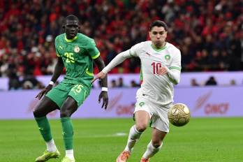 El Hadji Malick Diouf, de Senegal, y Brahim Diaz. de Marruecos, durante la final de la Copa de África 2026.