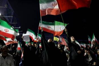 Ciudadanos iraníes durante una concentración en contra de Estados Unidos e Israel en Teherán el 29 de mayo de 2026.