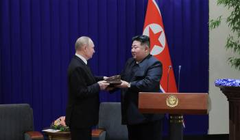 Imagen de archivo de los líderes Vladimir Putin y Kim Jong Un.