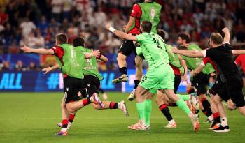 El equipo de Georgia celebrando la victoria ante Portugal.