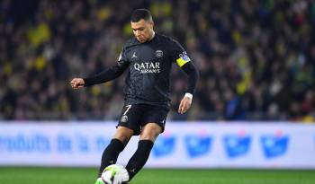 Kylian Mbappé durante un partido con el PSG.