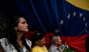 Simpatizantes de la líder opositora María Corina Machado asisten a una manifestación en Venezuela.
