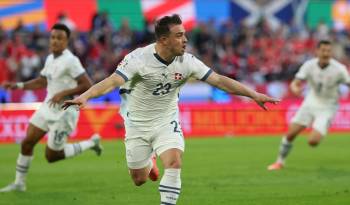 Xherdan Shaqiri celebra el 1-1 durante el partido del grupo A que han jugado Esocia y Suiza en Colonia, Alemania.