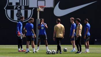 Jugadores del FC Barcelona durante un entrenamiento antes de enfrentarse al Inter de Milán.
