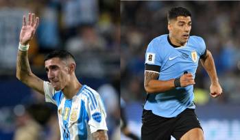Los futbolistas Ángel Di María (d.) y Luis Suárez.