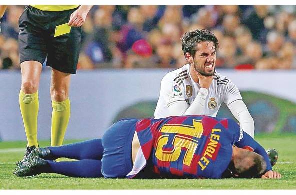 El Barcelona y el Real Madrio empataron sin goles en el Camp Nou y siguen igualados en la cima de la Liga Española.