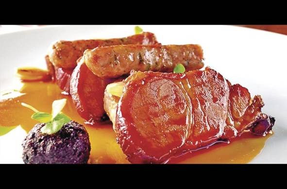 A Casa do Porco ofrece un menú con platos fuertes, embutidos curados y ahumados.