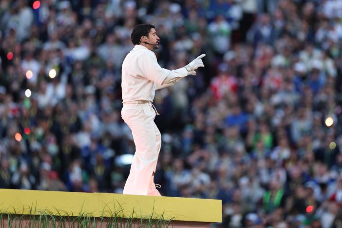 SANTA CLARA, CALIFORNIA - FEBRUARY 08: Bad Bunny performs onstage during the Apple Music Super Bowl LX Halftime Show at Levi's Stadium on February 08, 2026 in Santa Clara, California. Kevin C. Cox/Getty Images/AFP (Photo by Kevin C. Cox / GETTY IMAGES NORTH AMERICA / Getty Images via AFP)
