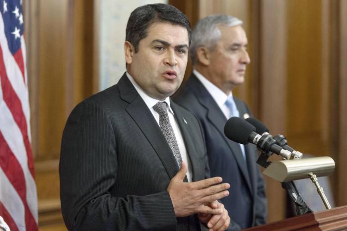 Fotografía de archivo del 24 de julio de 2014 del entonces presidente de Honduras, Juan Orlando Hernández, hablando durante una reunión en el Capitolio de Washington, D. C.