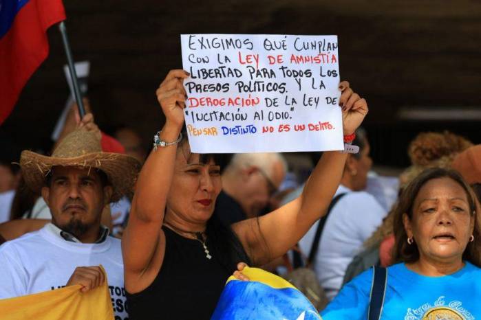 Esta manifestante exige la derogación de la ‘Ley de Incitación al Odio’.